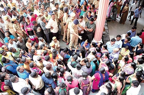 Hundreds of parents gather outside the school in the city on Wednesday | NAGESH POLALI