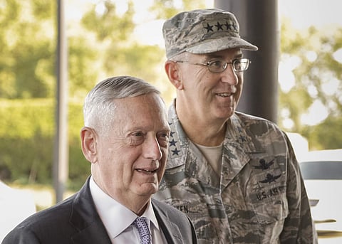 Secretary of Defense Jim Mattis, left, is escorted at Offutt Air Force Base by General John E Hyten, the head of Strategic Command. | AP