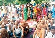 Families displaced by the Sardar Sarovar Dam project protest by shaving off their heads in Bhopal, Madhya Pradesh, on Thursday  | Express