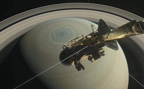 NASA's Cassini spacecraft is shown heading for the gap between Saturn and its rings during one of 22 such dives of the mission's finale in this illustration. | NASA official website