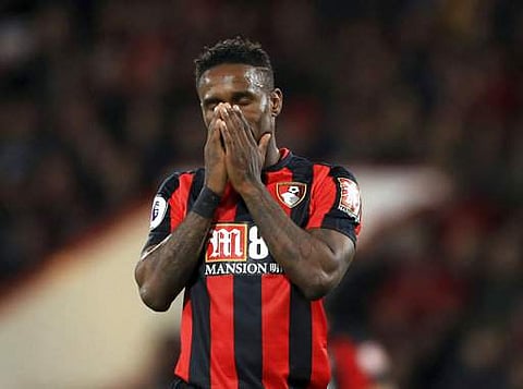 Bournemouth's Jermain Defoe reacts after a missed chance during the English Premier League soccer match between Bournemouth and Brighton, at the Vitality Stadium, in Bournemouth. | AP