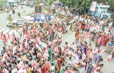 Women taking out a rally in Vijayawada on Friday demanding imposition of a ban on liquor in State | Express