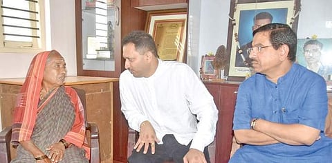 Union Minister Ananth Kumar Hegde with Lance Naik Hanumantappa’s mother Basamma at her house at Betadur in Hubballi on Sunday. MP Prahlad Joshi is also seen