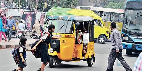 File picture of schoolchildren crossing  a busy road  | express photo