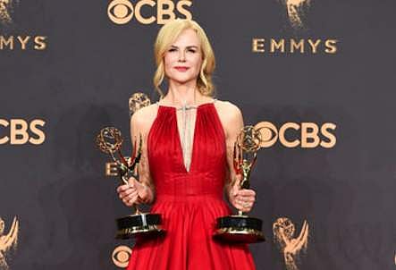 Nicole Kidman poses with her Emmy awards | AP