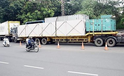Equipment that will be used for rehabilitating work arrives in  containers at Necklace Road  on Monday  | vinay madapu
