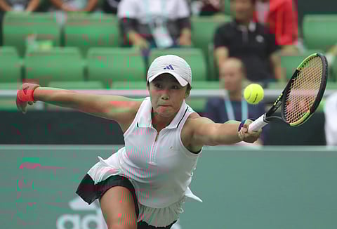 Han Na-lae of South Korea returns a ball to Kristyna Pliskova of the Czech Republic during their first round match of the Korea Open tennis championships in Seoul, South Korea, Tuesday, Sept. 19, 2017. | AP