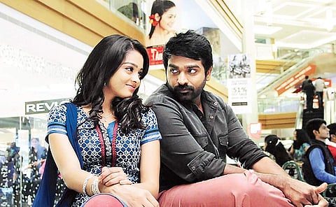 Gayathrie and Vijay Sethupathi in Puriyatha Puthir.