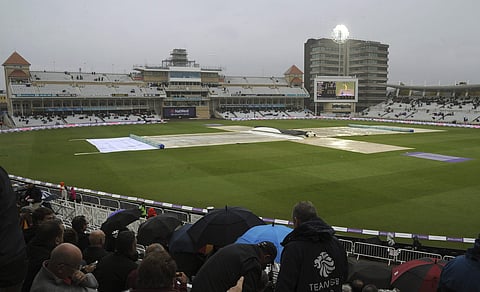 The pitch is covered as rain stopped play and match was later abandoned during the second One Day International match between England and West Indies at Trent Bridge, Nottingham, England, Thursday, Sept. 21, 2017. | AP