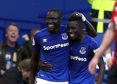 Everton's Oumar Niasse, left, celebrates scoring his side's second goal of the game with teammate Idrissa Gueye, during the EPL match against Bournemouth. | AP