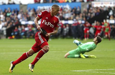 Watford's Richarlison celebrates scoring his side's second goal of the game during their EPL match against Swansea City. | AP