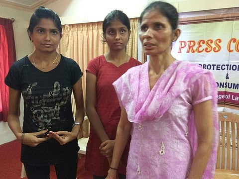 Jacinta with her daughters. (EPS)