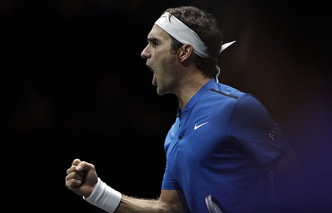 Europe's Roger Federer celebrates winning a point against World's Nick Kyrgios during their Laver Cup tennis match in Prague, Czech Republic. | AP