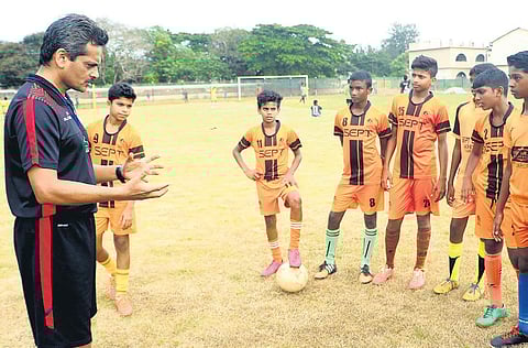 Children training at the SEPT football coaching camp at the Farook Higher Secondary School ground in Kozhikode | TP s00raj