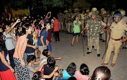 File photo of BHU girls engaged in an argument with the cops. (PTI)