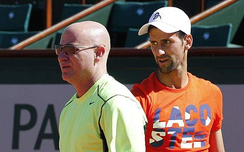 Eight-time Grand Slam champion Andre Agassi and tennis world number two Novak Djokovic | AP