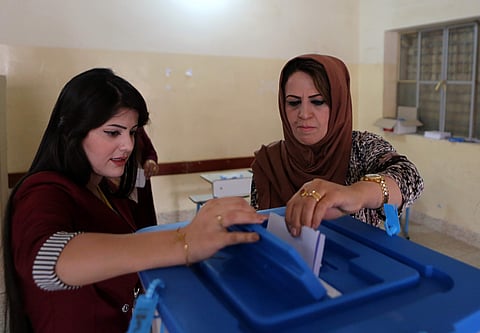 An Iraqi Kurdish woman casts her ballot during the referendum on independence from Iraq in Irbil, Iraq, Monday, Sept. 25, 2017. (Photo |AP)