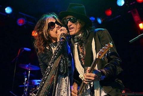 In this April 8, 2014 file photo, Steven Tyler, left, and Joe Perry of Aerosmith perform at the Whisky A Go Go in Los Angeles. (Photo | AP)