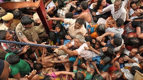 Pushkaralu ghat stampede, 2015: 29 people were killed and over 60 injured in a stampede during the Mahapushkaram, a Hindu religious bathing festival on the Godavari river bank, in Andhra Pradesh on 14 July 2015. In pic: Police and public helping the devot