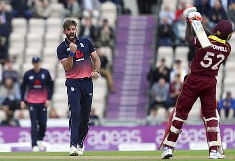 England's Liam Plunkett celebrates taking the wicket of West Indies' Rovman Powell, during the fifth one day international cricket match between England and the West Indies, at the Ageas Bowl, Southampton. | AP