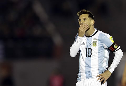 Argentina's Lionel Messi gestures during a 2018 World Cup qualifying soccer match against Uruguay in Montevideo. | AP