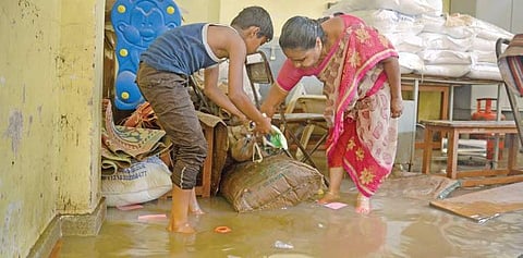 Foodgrains stocked at the anganwadi centre in Triveni Nagar, KR Puram, being salvaged on Monday | pushkar v