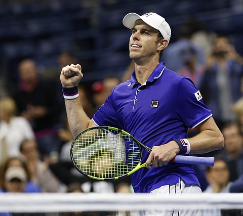 Sam Querrey, of the United States, reacts after defeating Mischa Zverev, of Germany, 6-2, 6-2, 6-1, in a fourth round match at the U.S. Open tennis tournament in New York, Sunday, Sept. 3, 2017. | AP