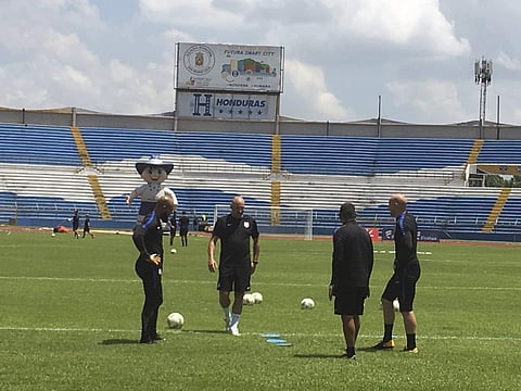 U.S. soccer goalkeepers Tim Howard, left, Nick Rimando, second from right, Brad Guzman, right, and goalkeeper coach Matt Reis, second from left, practice at Estadio Olimpico Metropolitano in San Pedro Sula. | AP
