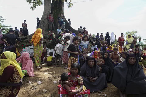 Myanmar's Rohingya Muslim ethnic minority members wait to enter the Kutupalong makeshift refugee camp in Cox's Bazar, Bangladesh. (File | AP)