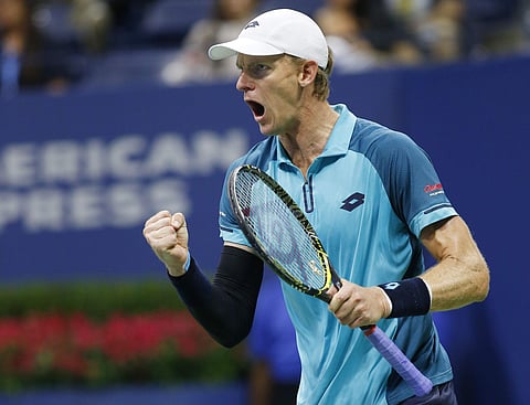 Kevin Anderson, of South Africa, reacts winning the third set in a quarterfinal against Sam Querrey, of the United States, at the U.S. Open tennis tournament in New York. | AP