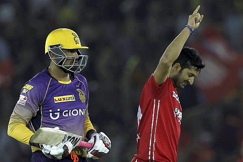 Mohit Sharma of Kings XI Punjab celebrates the wicket of Yusuf Pathan of the Kolkata Knight Riders during the IPL match in Mohali. | PTI