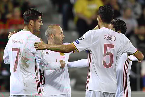 Spain's Alvaro Morata, left, reacts after scoring, to take the score to 0-2 against Liechtenstein during the 2018 Fifa World Cup Russia group G qualification soccer match. | AP