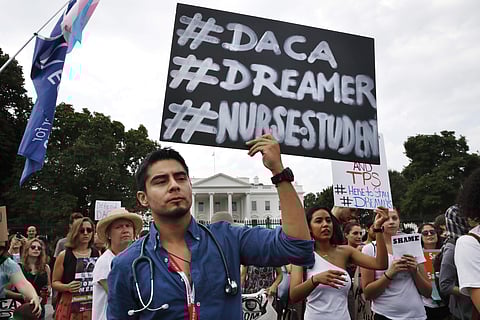 Students rally with others in support of DACA outside of the White House, in Washington on Tuesday. (Photo | AP)