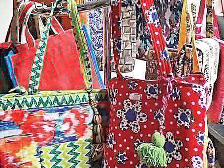 The bags made out of donated waste clothes
