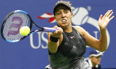 Madison Keys, of the United States, chases down a shot during second set of a quarterfinal against Kaia Kanepi, of Estonia, at the U.S. Open tennis tournament in New York. | AP