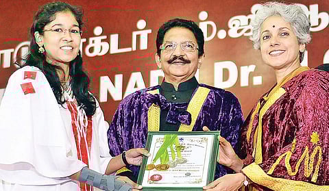 Topper Niveditha Shama (left) awarded her degree by Governor Ch Vidyasagar Rao and Soumya Swaminathan, Secretary, Department of Health Research, Union ministry, during the convocation of the TN Dr MGR Medical University on Wednesday  | D SAMPATHKUMAR