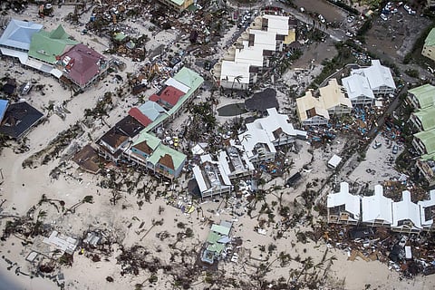 Hurricane Irma caused heavy destruction in the Caribbean Islands, killing at least 12 people, leaving thousands homeless and plunging above one million residents of Puerto Rico into darkness. (Photo | Dutch Defense Ministry via AP)