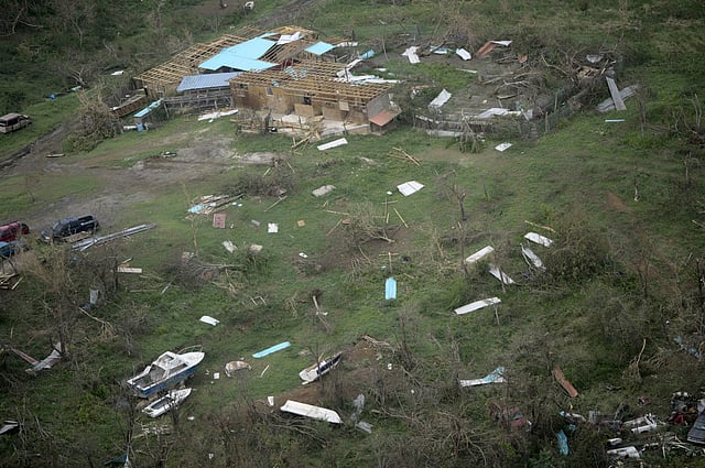 Devastated buildings from the island of Culebra, which suffered damages by the passage of Hurricane Irma, are seen form the air, in Puerto Rico. About a million people were without power in the U.S. territory after Irma passed just to the north, lashing the island with heavy wind and rain. Nearly 50,000 also were without water. (Photo | AP)