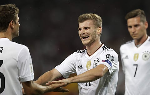 In this Monday Sept. 4, 2017 file photo Germany's Timo Werner celebrates after scoring his side's fourth goal during the World Cup Group C qualifying soccer match between Germany and Norway. | AP