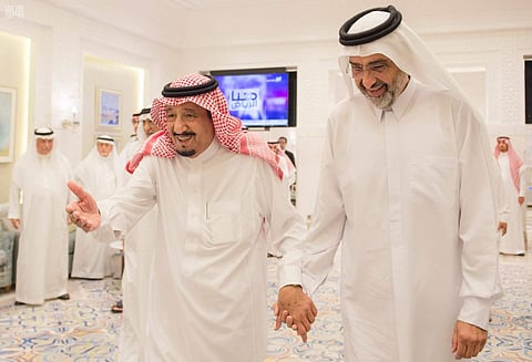 Saudi King Salman, left, meets Qatari Sheikh Abdullah Al Thani, right, at the monarch's vacation home. (File photo | AP)