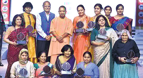 The winners of The Sunday Standard Devi Awards with Uttar Pradesh Chief Minister Yogi Adityanath and The New Indian Express’ Editorial Director Prabhu Chawla. The media group presented the awards to 11 super-achievers from the state in Lucknow on Wednesda