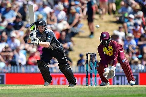 New Zealand's Glenn Phillips (L) bats during the first Twenty20 international cricket match between New Zealand and the West Indies at Saxton Oval in Nelson on December 29, 2017. | AFP
