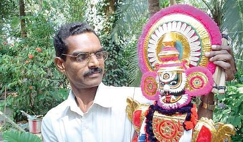 Artist K V Ramesh with  one of the props