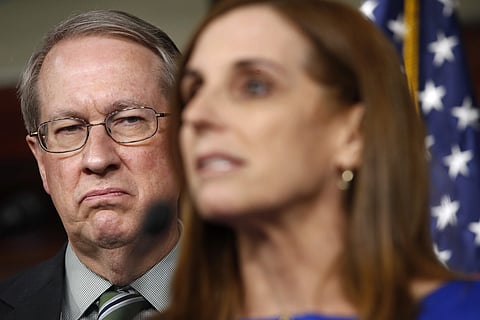 House Judiciary Committee Chairman Rep. Bob Goodlatte, R-Va., left, listens as House Homeland Security Border and Maritime Security Subcommittee Chairwoman Rep. Martha McSally, R-Ariz., speaks during a news conference, Wednesday, Jan. 10, 2018, on Capitol