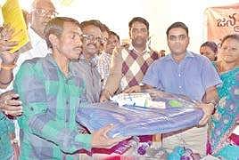 A file photo of collector Vivek Yadav distributing blankets to beneficiaries during the Janmabhoomi-Maa Vooru programme in the disputed Kothia panchayat in Salur mandal of Vizianagaram district on Tuesday | Express