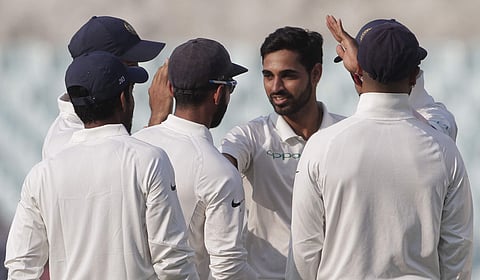 Bhuvneshwar Kumar (without cap) had rocked the Proteas with three wickets on the opening day of the first Test (File | AP)