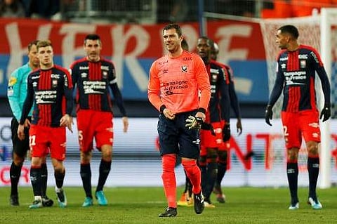 Caen's French goalkeeper Remy Vercoutre (C) leaves the pitch after receiving a red card during the French L1 football match between Caen (SMC) and Lille (LOSC) on December 13, 2018, at the Michel d'Ornano stadium, in Caen, northwestern France | Photo: AFP