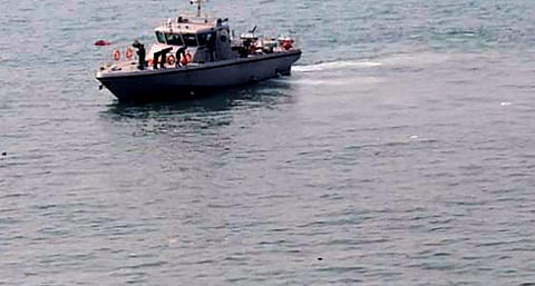 Rescue boat looking for survivors and bodies of victims of boat carrying schoolchildren in the Arabian Sea in Dahanu in Maharashtra on Saturday. | PTI