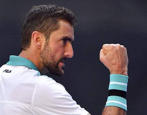Croatia's Marin Cilic celebrates a point win over Canada's Vasek Pospisil during their first round match at the Australian Open tennis championships in Melbourne | Photo: AP