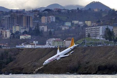 A Boeing 737-800 of Turkey's Pegasus Airlines after skidding off the runway downhill towards the sea at the airport in Trabzon, Turkey, Sunday, Jan. 14, 2018.